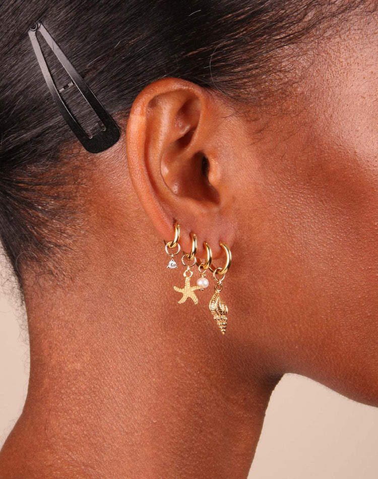 Shelly & Marcel on the Mili Gold Hoops